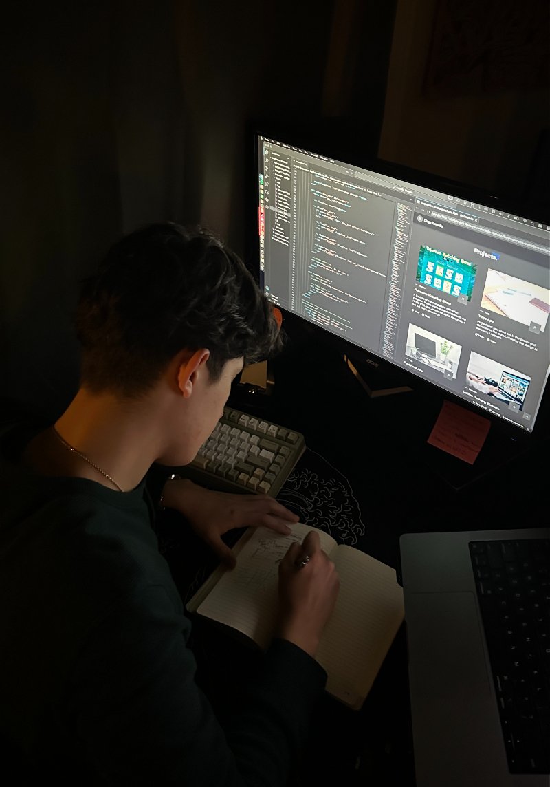 Diego Zamudio working at a desk